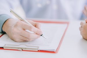 person doing business accounting services for a dental practice